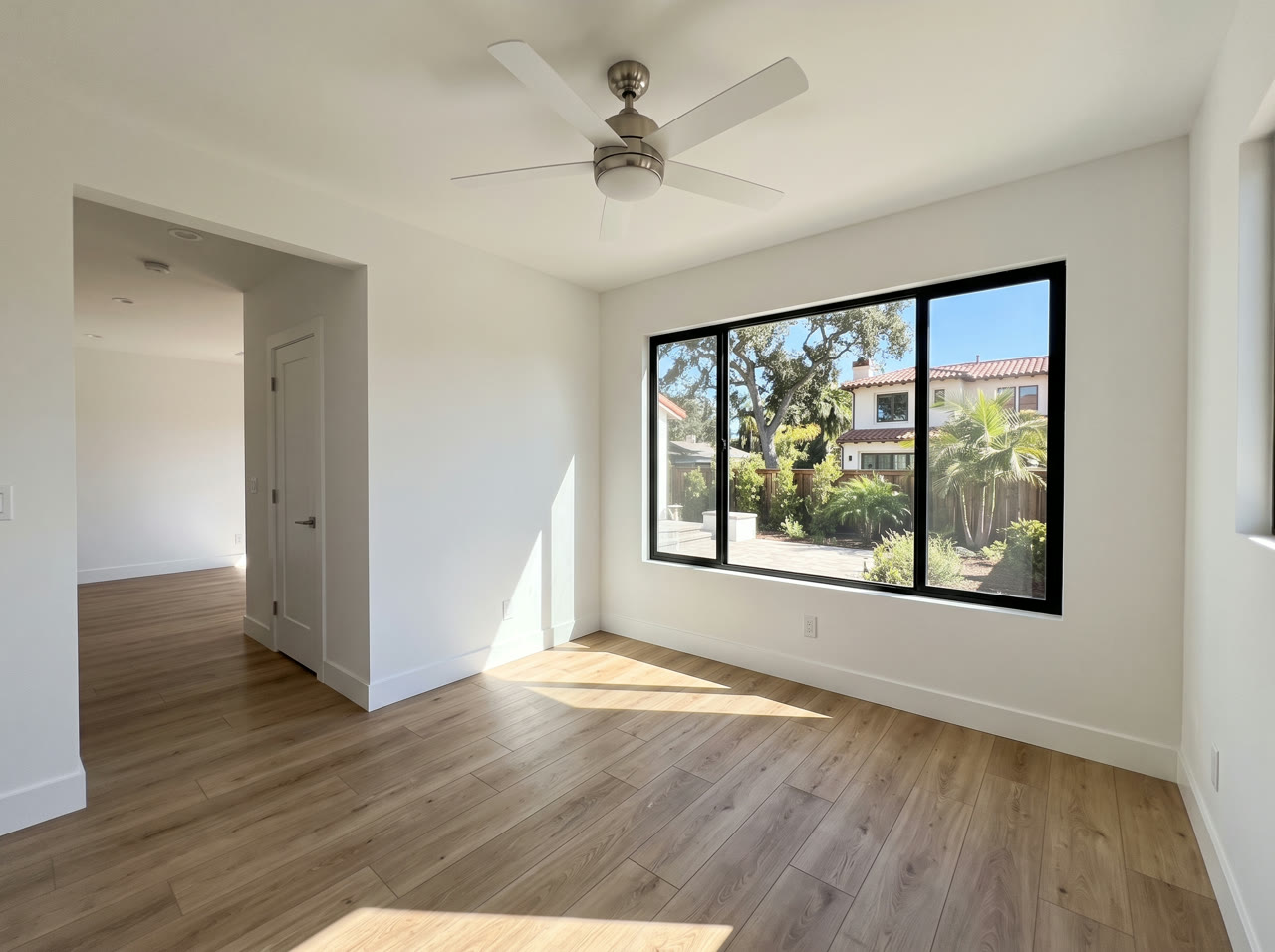 Bright ADU bedroom with a large window