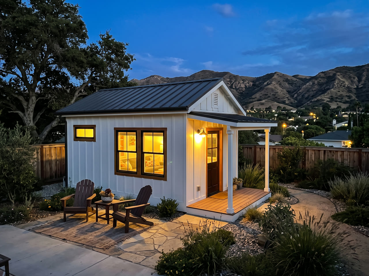 Finished backyard ADU lit up at dusk